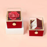 Boîte-cadeau rose rotative et présentoir à bijoux