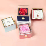 Boîte-cadeau rose rotative et présentoir à bijoux